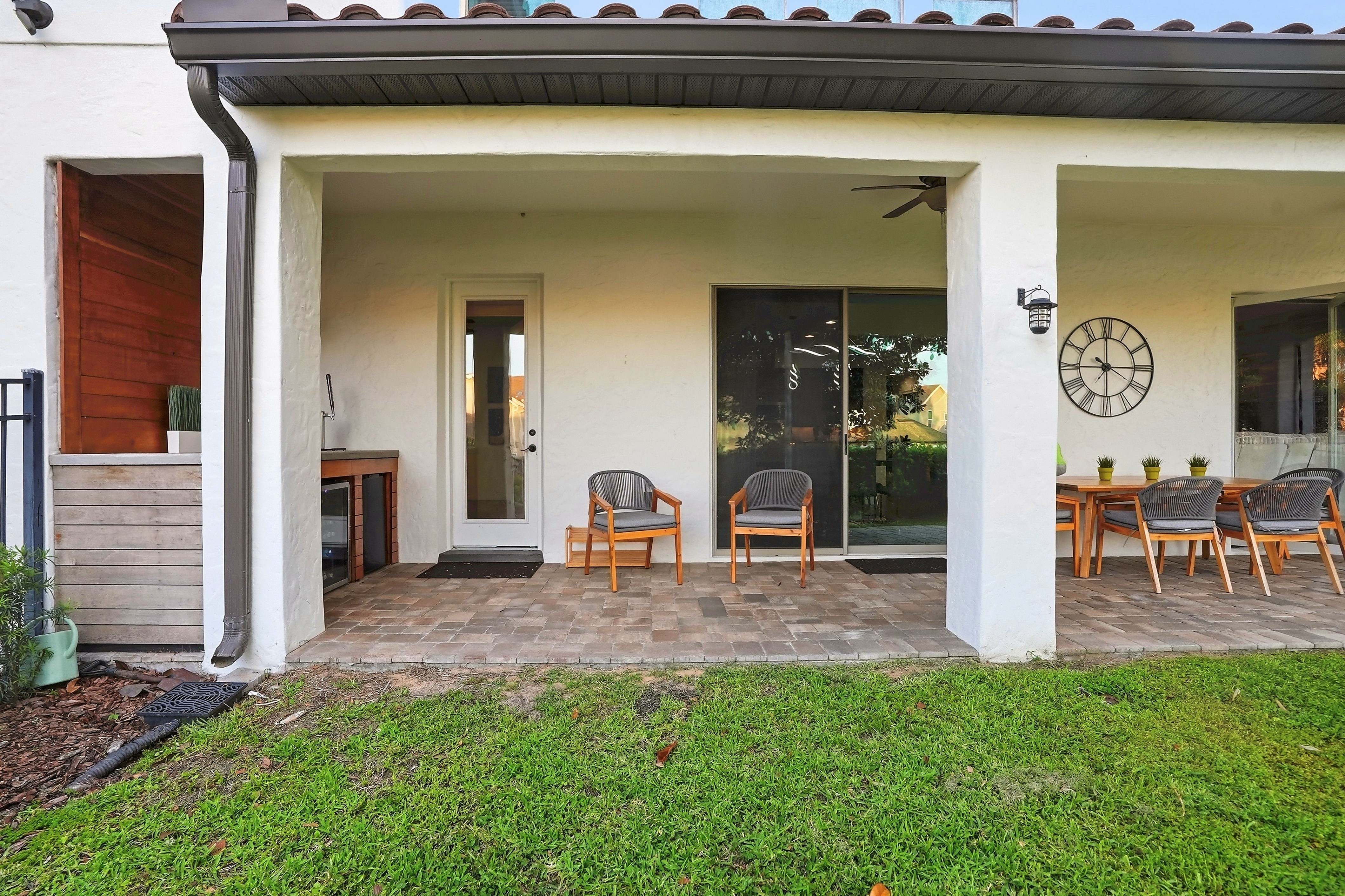 Covered outdoor patio with seating