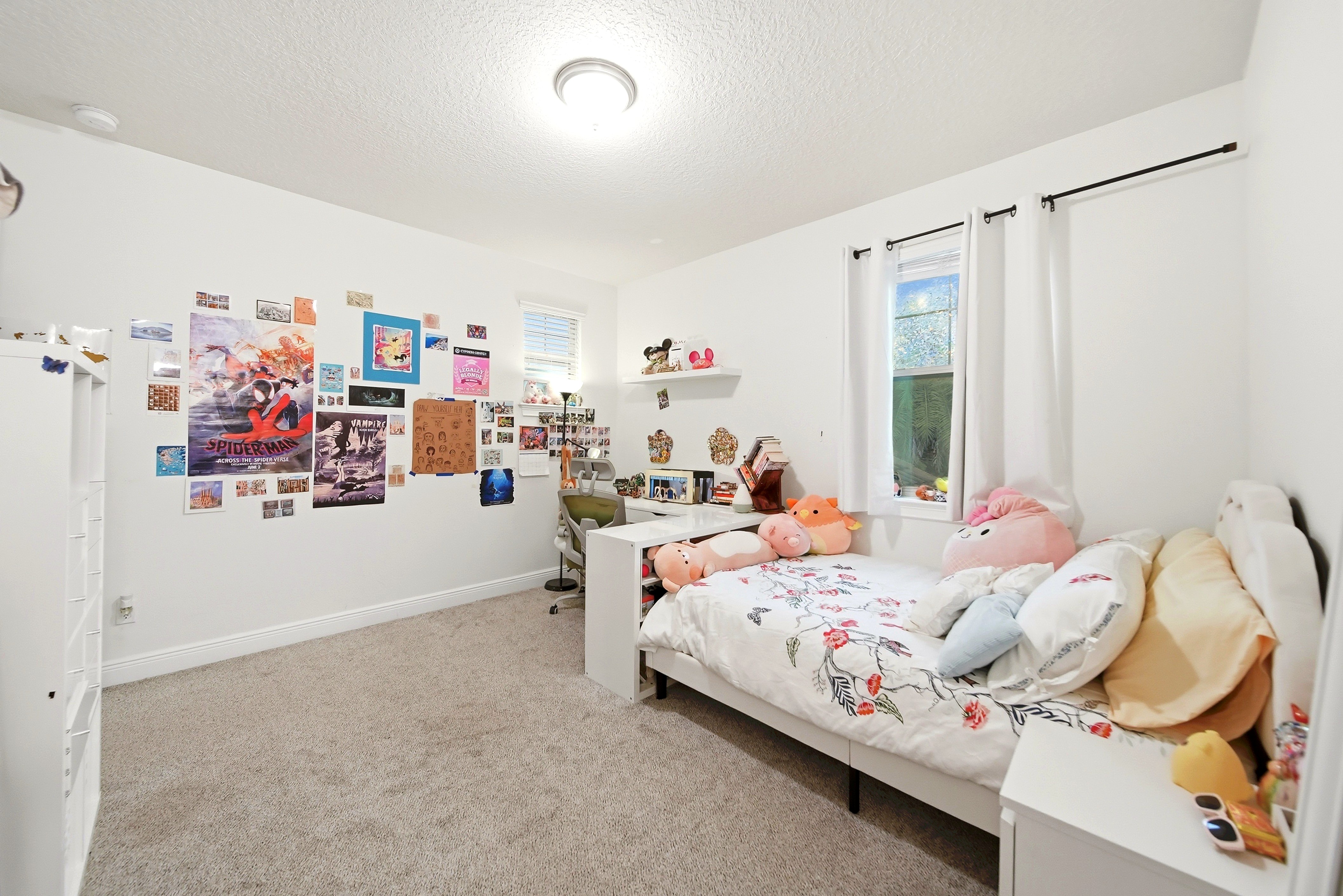 Bedroom with bed and desk